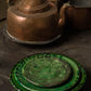 Tre gröna Tamegroute tallrikar av keramik